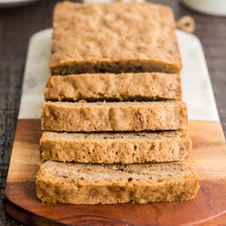 Sliced Bread made of zucchini and walnuts on a board