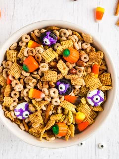 bowl of halloween candy and chex mi