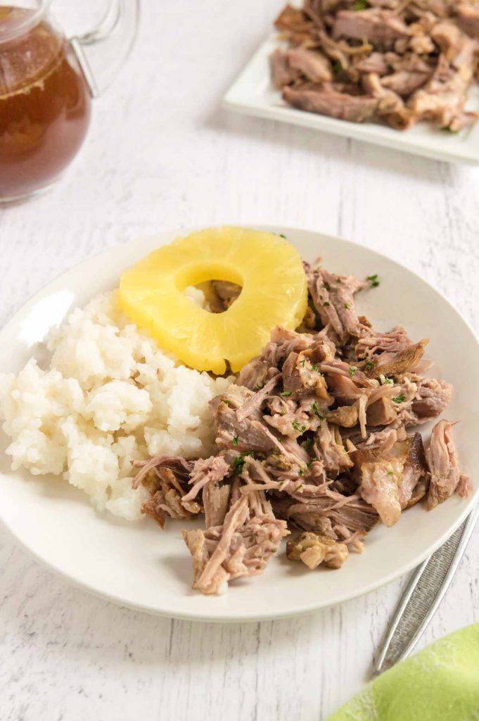 dinner plate with Kalua pork, steamed rice and pineapple