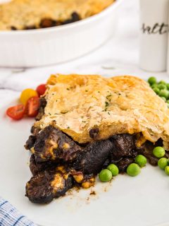 large serving of a guinness and beef casserole pie