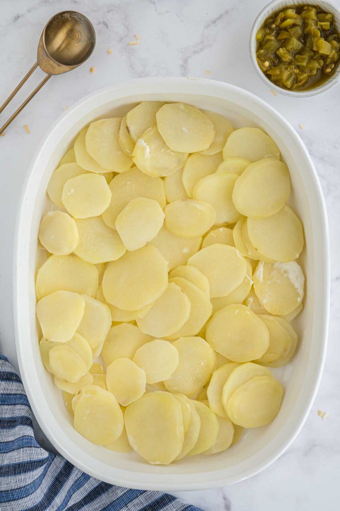 layering potatoes, then chillis
