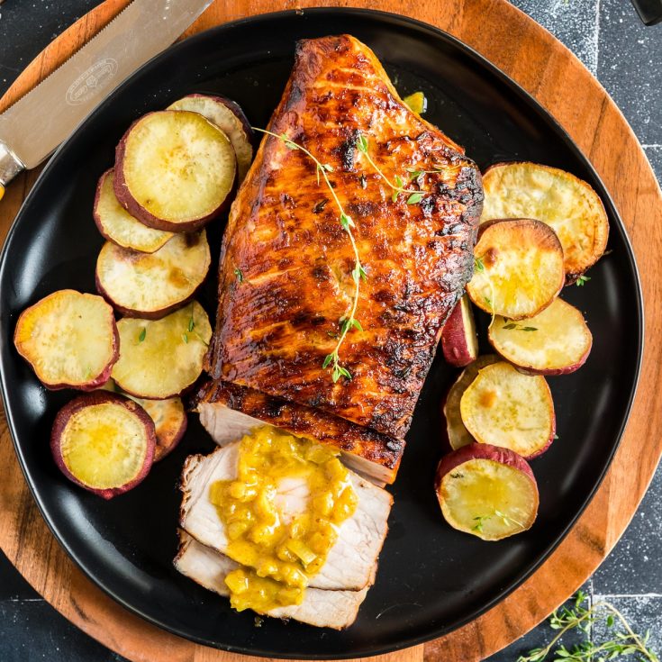 Serving air fryer pork tenderloin with potatoes