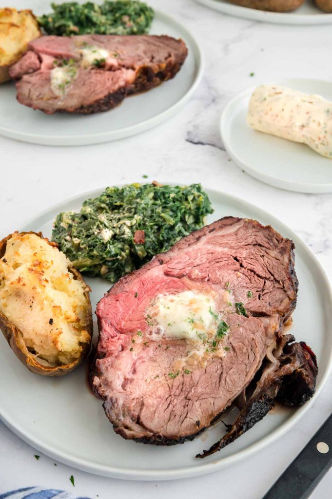 plate of grilled prime rib on a table