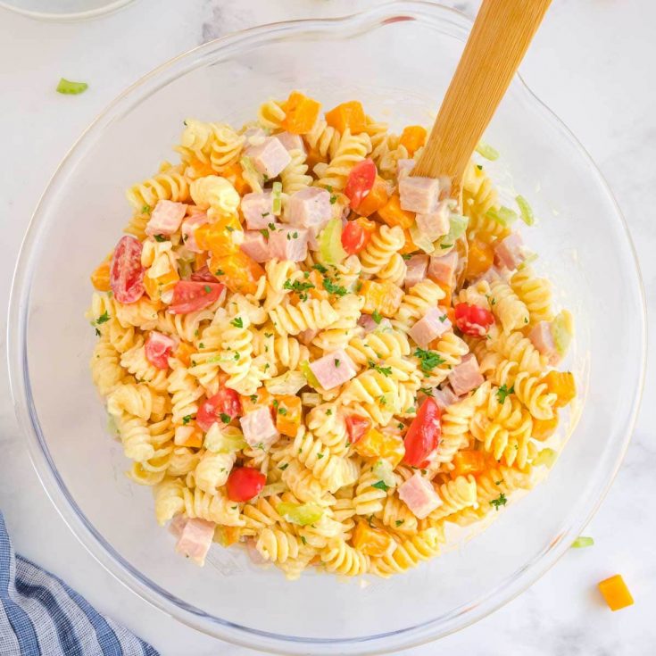 Closeup of pasta salad in a glass bowl