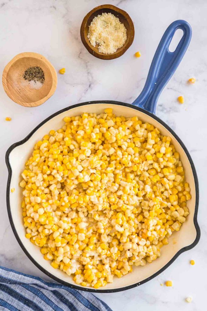 skillet full of parmesan honey butter corn